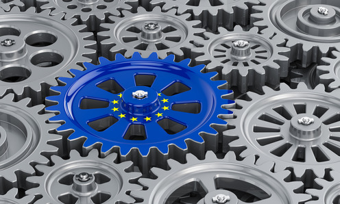 The European Union flag on the gearwheel, business industrial co Zahnräder